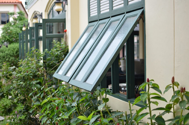 Awning window hinged at top, opening outward